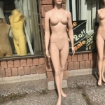 Female mannequin in skin tone pose