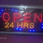 open-24-hour LES sign